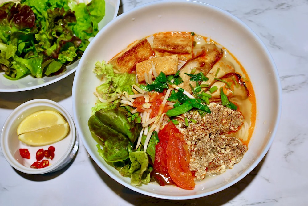 Vegan Bun Rieu with sweet and clear broth, fragrant and fatty crab and mushroom soup, with a unique flavor 
